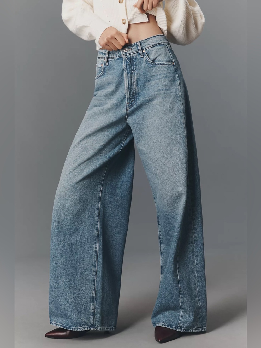 MOTHER 
The Pipe Dream Button Sneak High-Rise Jeans Free People Anthropologie